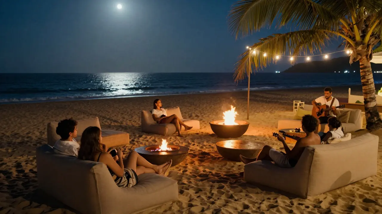 Beachside lounge at night with fire pits, acoustic guitarist, and moonlit ocean creating a calm atmosphere.