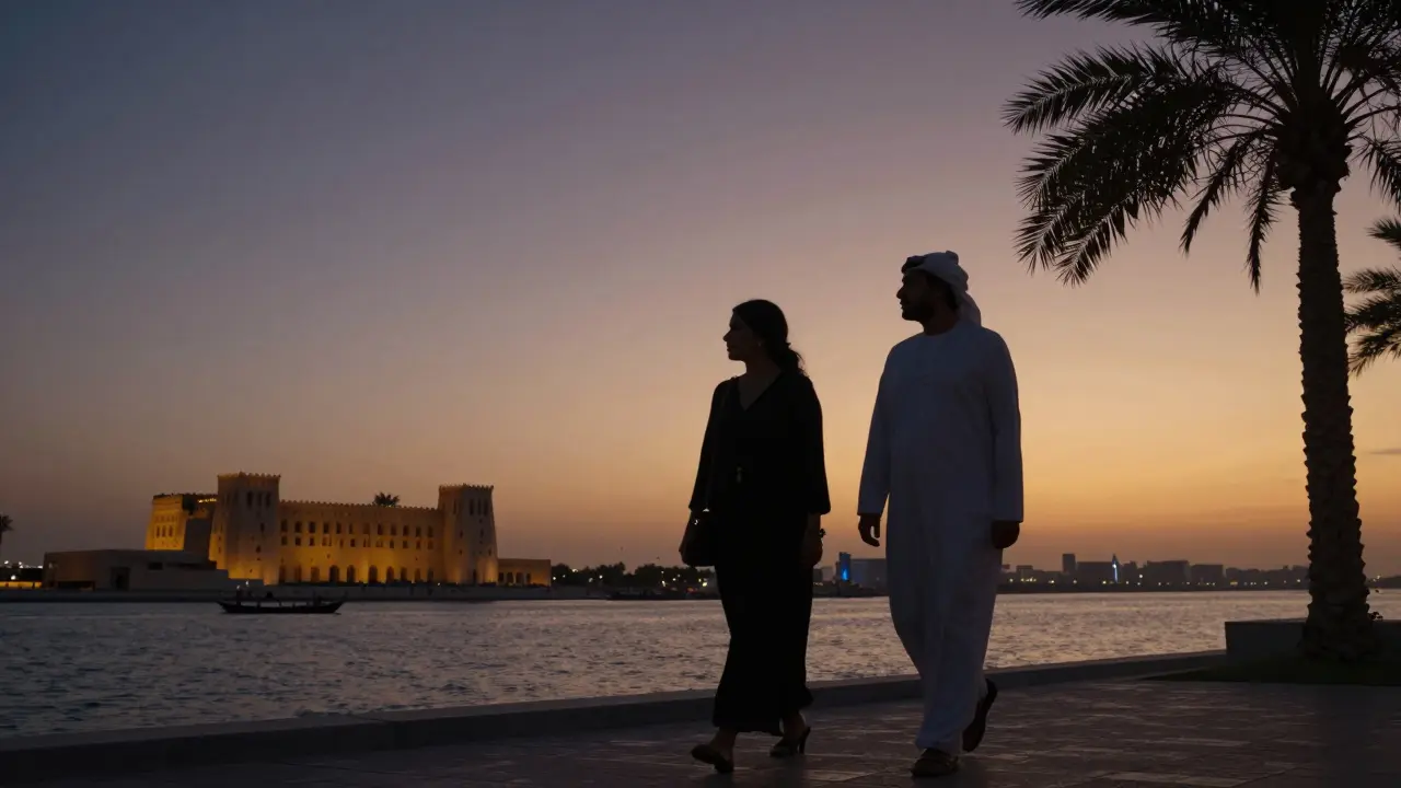 Two people walking peacefully along the Corniche at sunset, with Qasr Al Hosn in the background, embodying discreet companionship.
